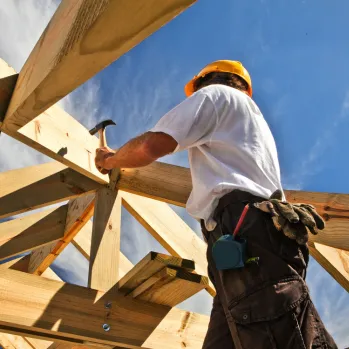 Professional construction site in Los Angeles featuring a new home build with active framing and structural reinforcement by the Best Construction LA team.