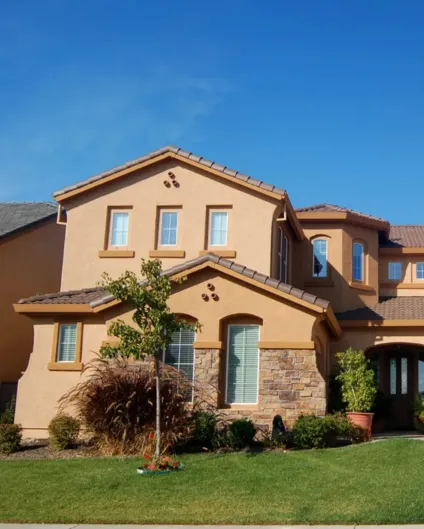 Luxury custom home built by custom home builders in Los Angeles featuring modern architecture, large windows, and premium exterior finishes.