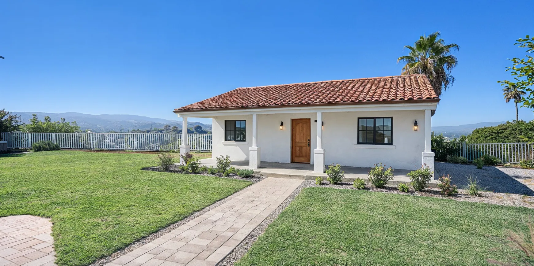 Completed ADU built by Los Angeles ADU builders with finished exterior and landscaped backyard